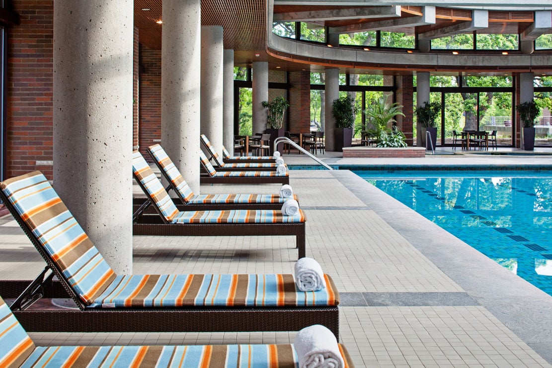 indoor pool with chairs